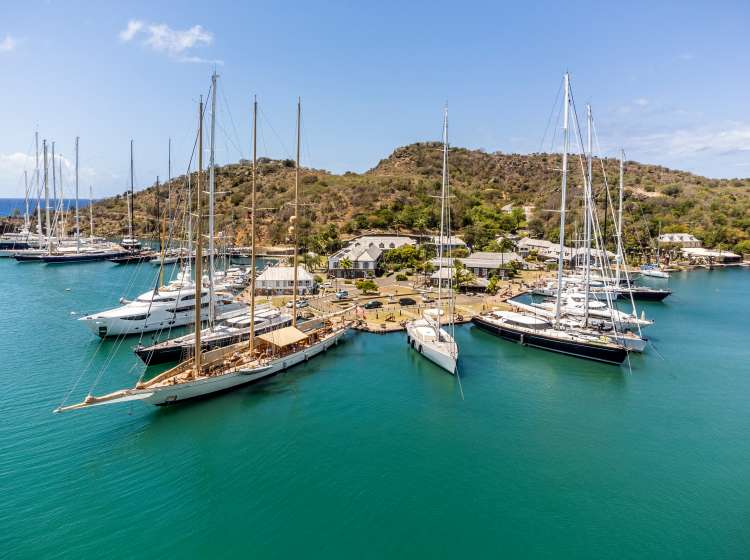 drone perspective of super yachts in the english harbour of antigua