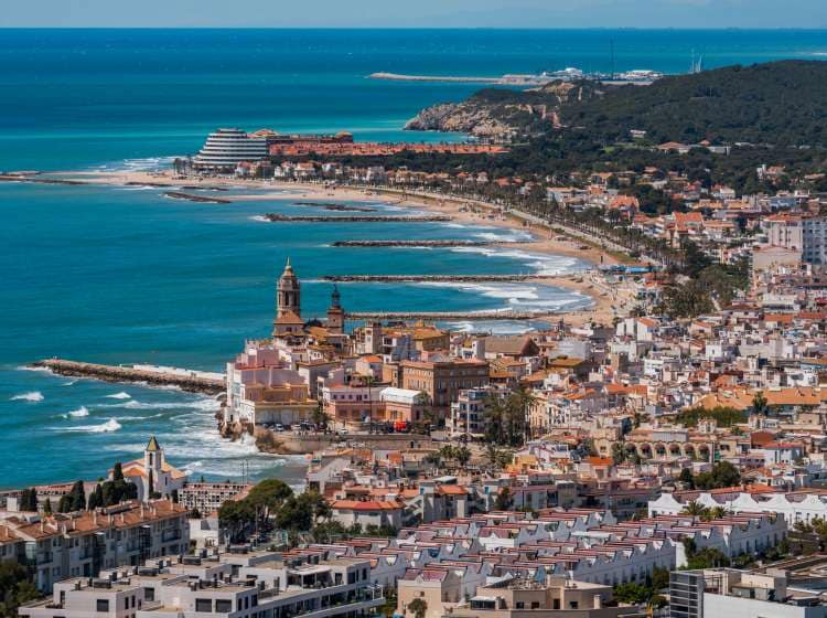 Sitges is a town near Barcelona in Catalunya, Spain. It is famous for its beaches and nightlife.