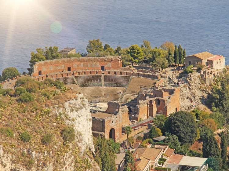 View of the Old Town of Taormina, the Sea and the Greek Theater. The island of Sicily, Italy.