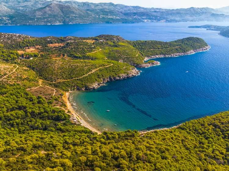 Sandy beach on Elaphites island Lopud with a view to the Dubrovnik archipelago.; Shutterstock ID 193776716; Invoice Number: -