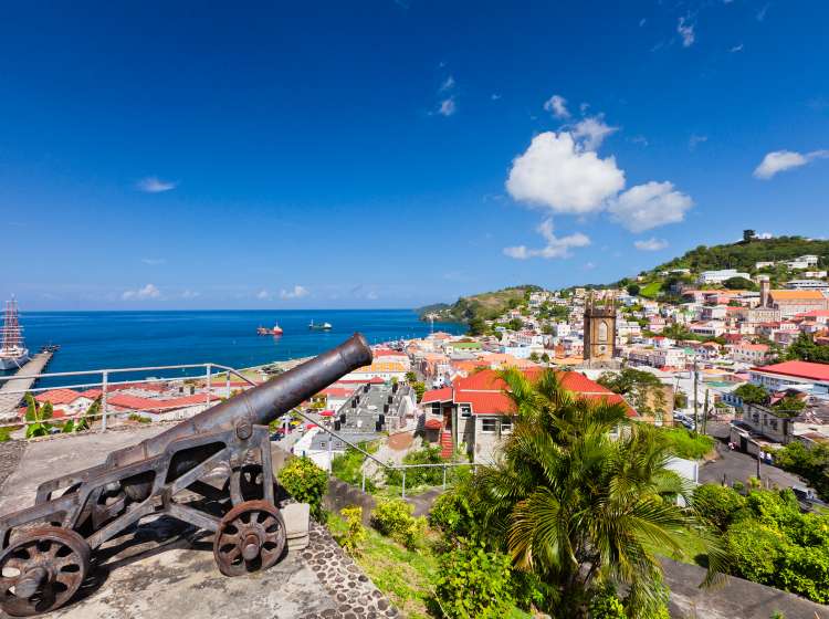 Cannon located on Fort George is pointed to St. George's, the capital city of Grenada. Built by the French in 1650, this beautiful city, facing a horseshoe-shaped harbor called The Carenage, is surrounded by a hillside of an old volcano crater. The French also built Fort George in 1705 on the promontory overlooking the city. Although most of the building is currently used by the police, visitors can stroll in the fortress and enjoy the breathtaking panorama over the city and harbor. Canon EOS 5D Mark II