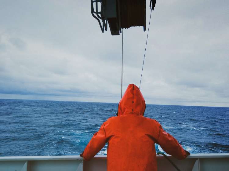 Fisherman on the fishing boat deck