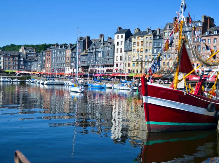 This beautiful seaport town is as picturesque as it looks.   Situated in the Calvados region of France (Normandy) Honfleur somehow escaped the ravages of WWII,  and has managed to preserve the traces of a rich historical past.  Often considered the birthplace of Impressionism, and remains on of the most painted scenes in France.