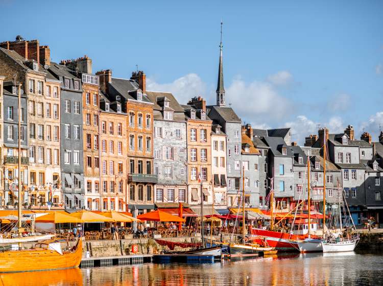 Waterfront with beautiful old buildings in Honfleur, famous french town in Normandy