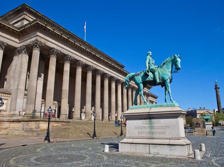 A view taking in the sights of St. George's Hall, the Prince Albert Statue, the Queen Victoria Statue, Liverpool Cenotaph, County Sessions House and Wellington's Column.