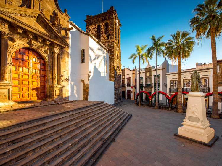 Central square in old town with Salvador church and monument in Santa Cruz de la Palma in Spain; Shutterstock ID 386012296; Invoice Number: -