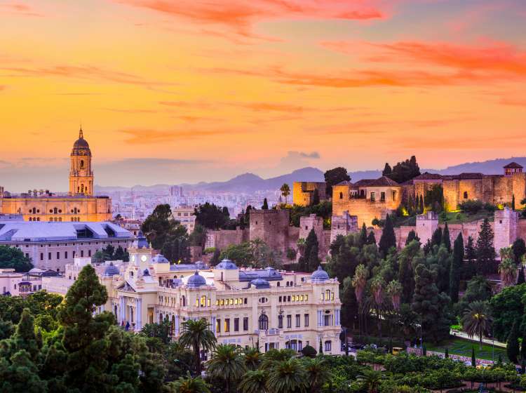 Malaga, Spain cityscape at the Cathedral, City Hall and Alcazaba citadel of Malaga.