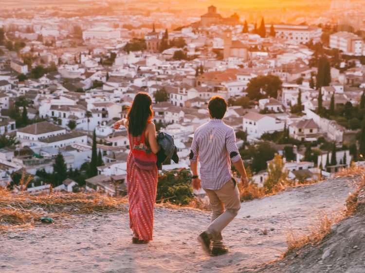 Boy and girl on mountain in Granada,Spain.