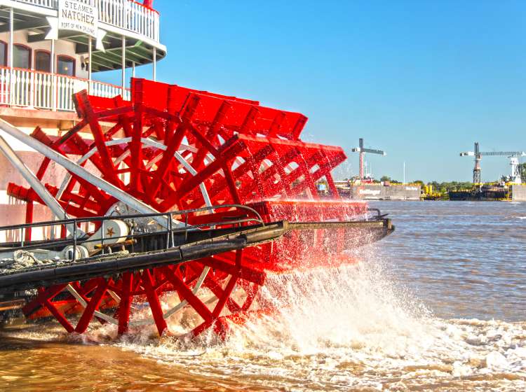 PaddleWheel on a steamboat as she leaves for an evening cruise