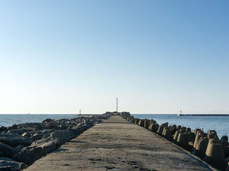 concrete breakwater in Klaipeda port pier at gates; Shutterstock ID 717516190; Invoice Number: -