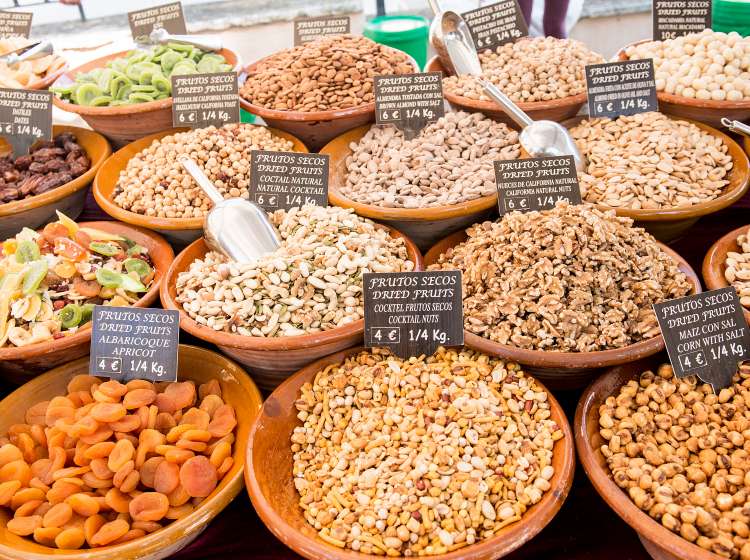 Selection of dried fruits and nuts for sale at Sineu market, Mallorca, Spain.; Shutterstock ID 770243518