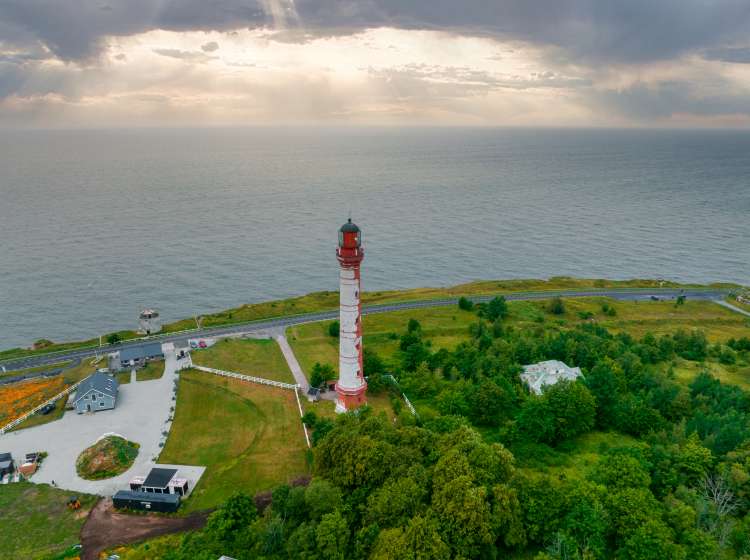 Beautiful limestone cliff on Pakri peninsula, Estonia with the historic lighthouses. One of the oldest lighthouses in Europe.