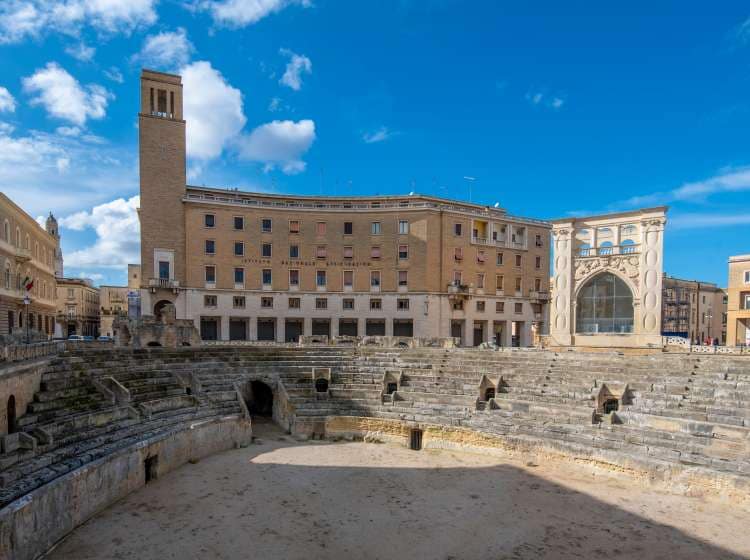 LECCE, Puglia ,Italy - March 08, 2019: Panoramic view of the Roman amphitheater (Anfiteatro romano),  on Sant'Oronzo Square (Piazza) in the old town. Apulia