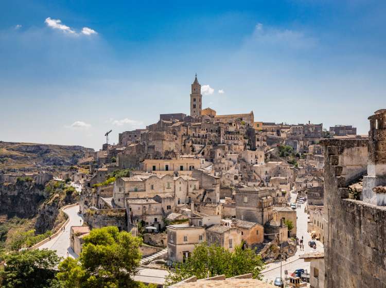 Matera, Basilicata, Italy - Panoramic view of the Civita and the Sasso Barisano. The ancient houses of stone and brick, carved into the rock. The Sassi of Matera.