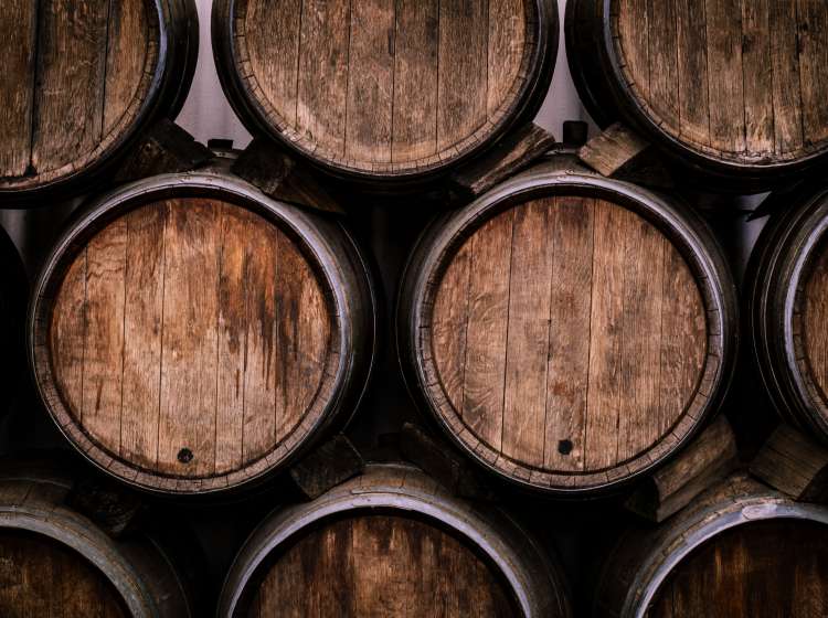 Wine casks at the winery. Stacked Wine barrels at the german winery.; Shutterstock ID 1168609957; Invoice Number: -