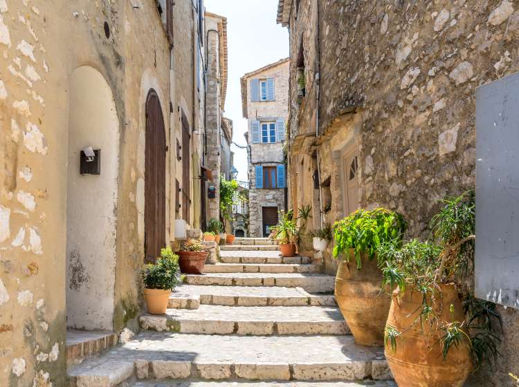  typical narrow street with tourists in St Paul de Vence, France.; Shutterstock ID 637252243; Invoice Number: -