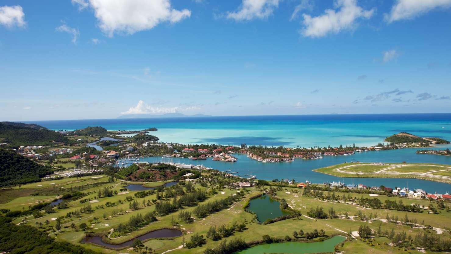 Overhead photo of Jolly Harbour, Antigua. Jolly Beach and golf course.