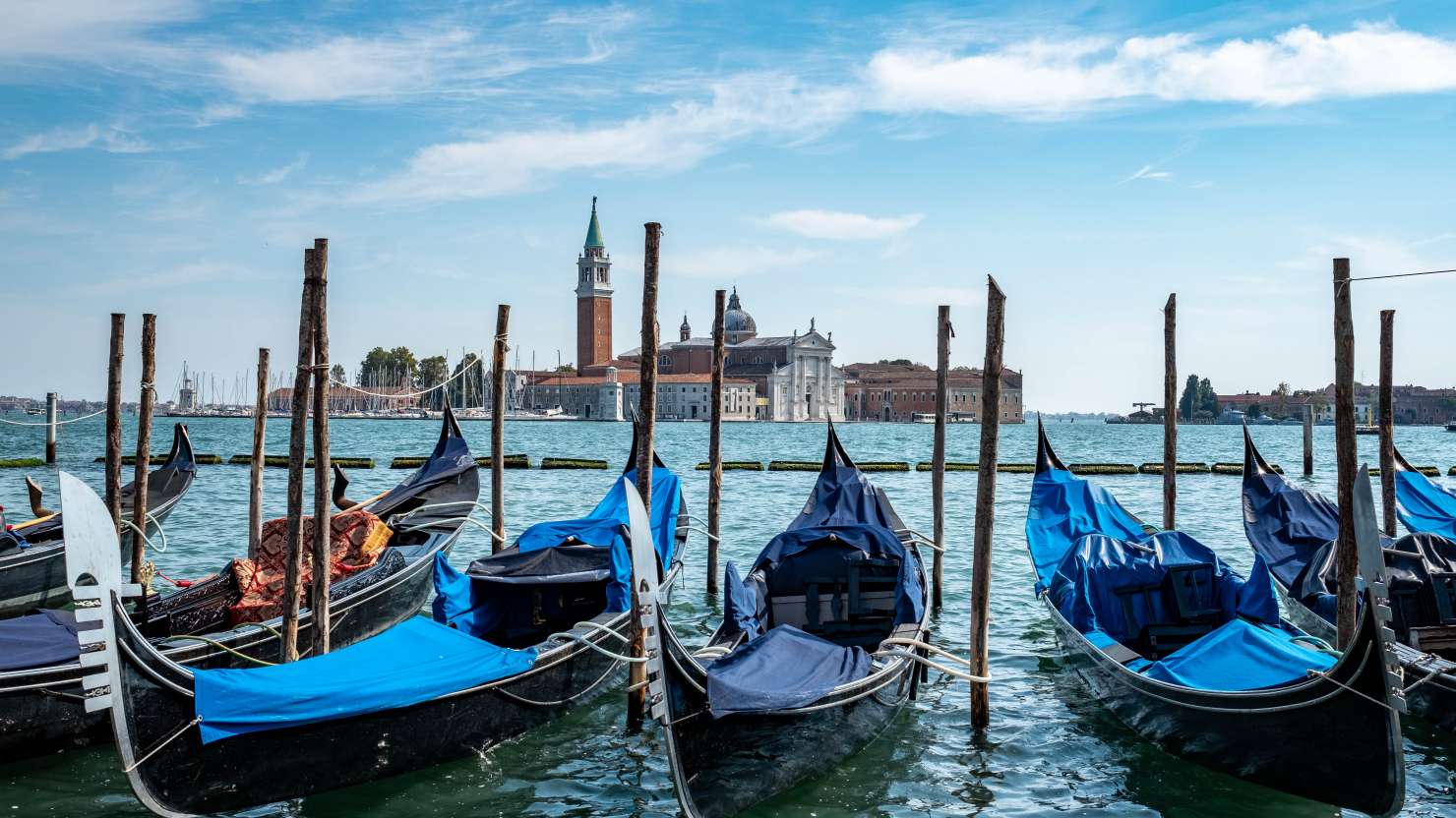 Venice is arguably one of Italy's most picturesque cities. With its winding canals, striking architecture, and beautiful bridges, Venice is a popular destination for travel.