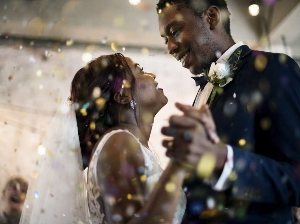 Newlywed African Descent Couple Dancing Wedding Celebration