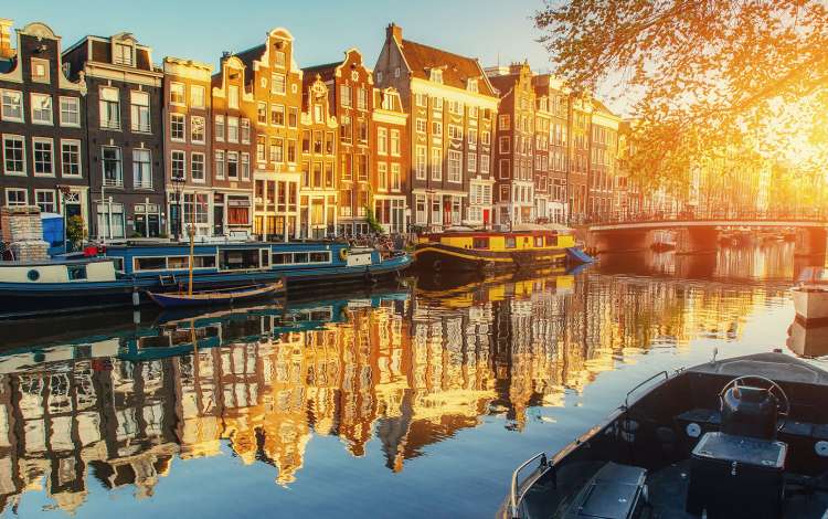 View of sunset over canal in Amsterdam