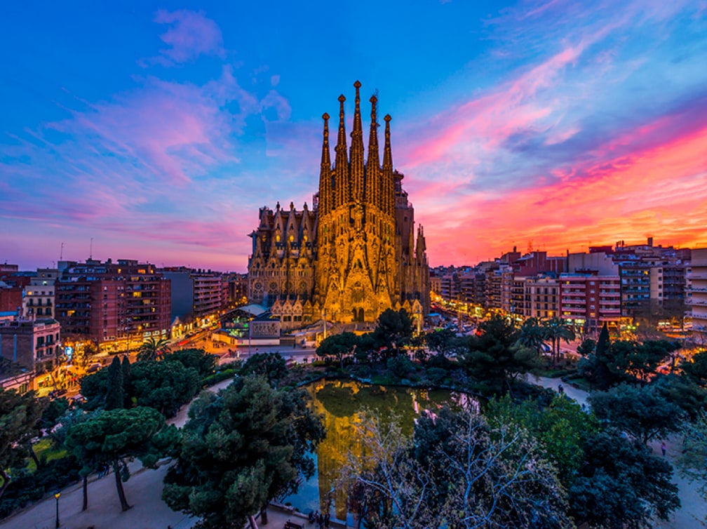 Sagrada Familia in Barcelona with red sky in the background