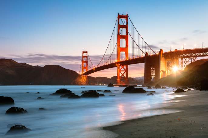 Dawn at the Golden gate bridge from Baker beach, San Francisco, California, USA