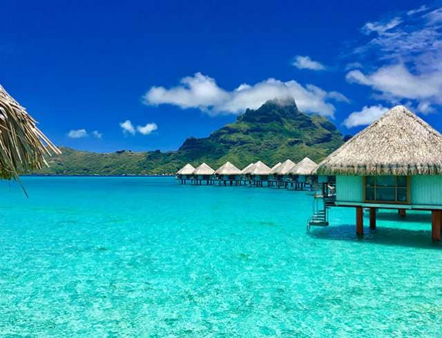 Overwater bungalows alongside French Polynesian islands