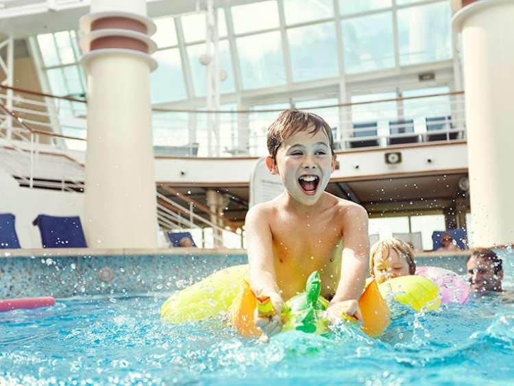 Family enjoying swimming pool